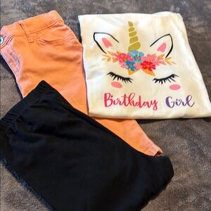 Girls Unicorn Birthday Tee with matching black Leggings and creamsickle Shorts.